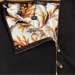 Versace black mini skirt 7.5 inches. Never worn. See QR for verification.